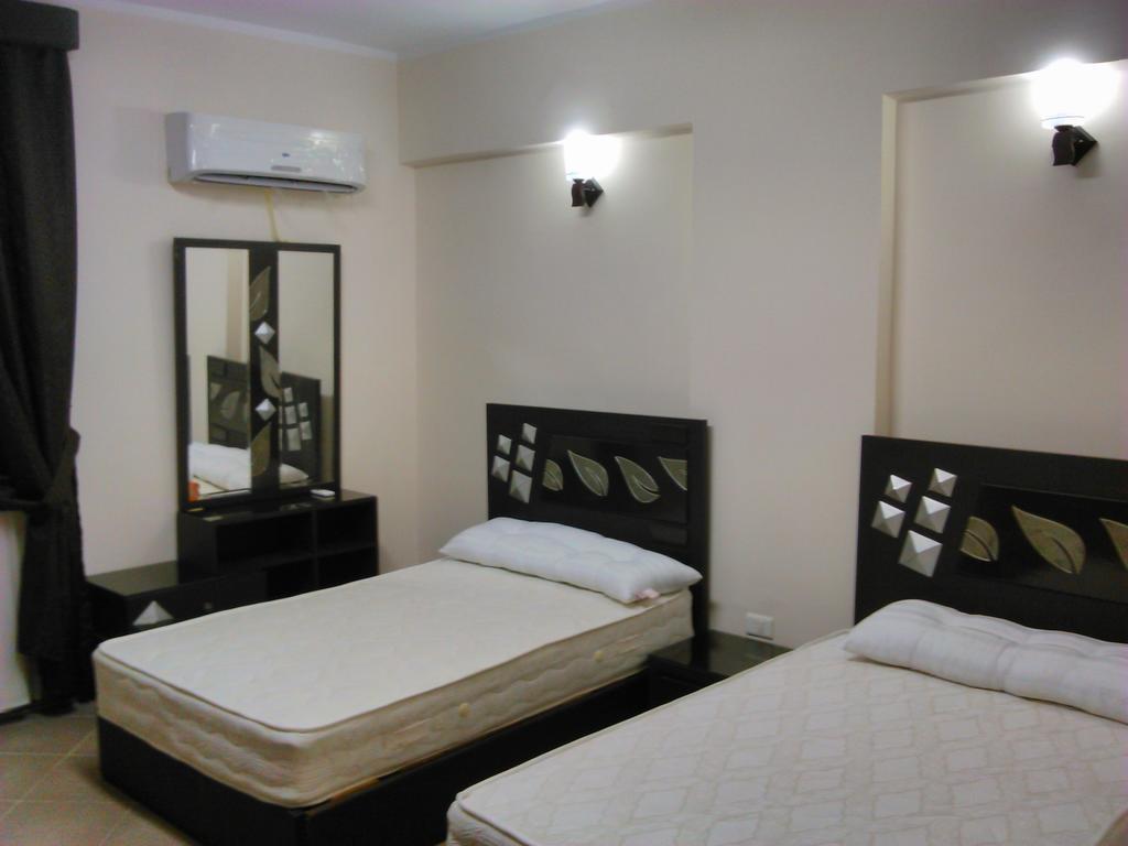 Three-Bedroom Apartment At Louly Beach Resort Ain Sukhna Room photo